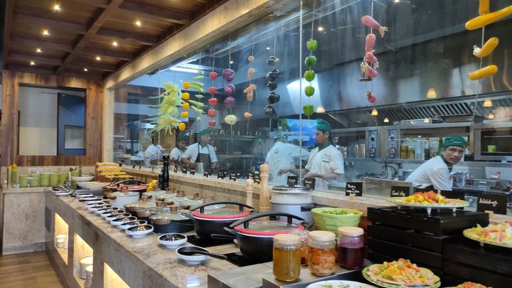 Live kitchen showcase with professional chefs at work