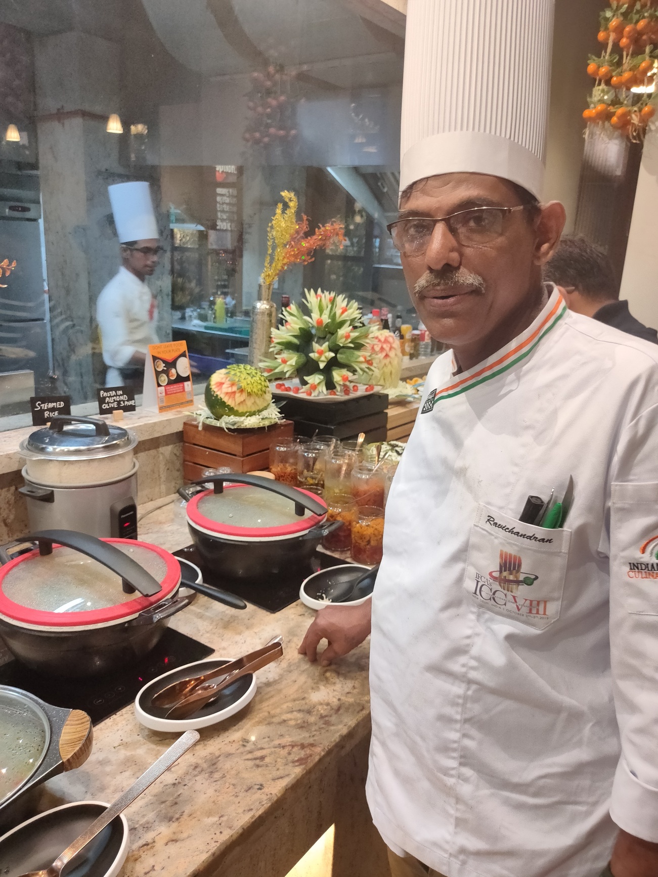 Chef AVR at restaurant entrance